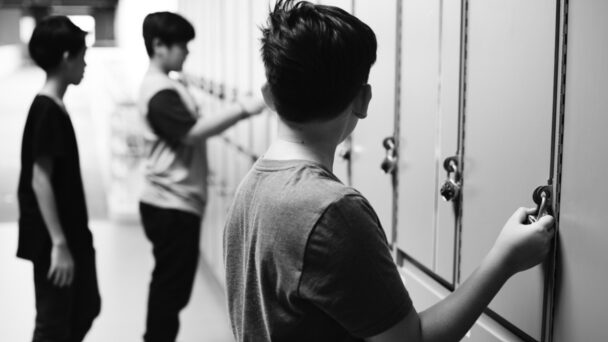 Young teens at their school lockers