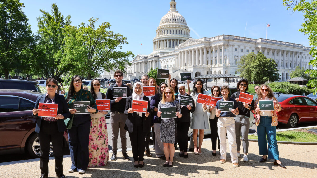 Members of Community Catalyst pose for a photo on the Medical Debt Day of Action on Capitol Hill in Washington, D.C.