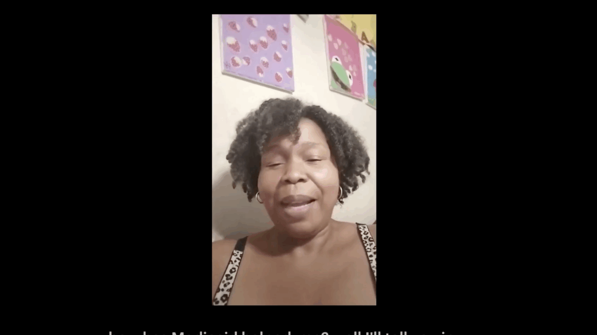 A woman with curly hair sits in front of a wall with art displayed. The caption below says "how has Medicaid helped me? Well I'll tell you in..."